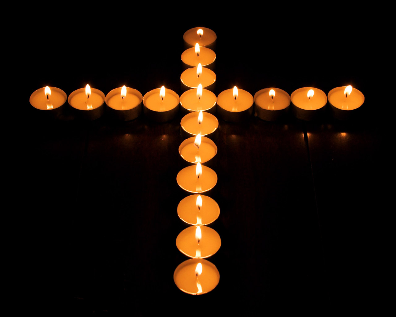 candles in the form of a cross